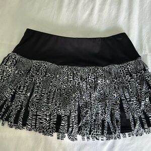 Lucky in Love tennis skirt. Size Small like new condition. Black animal print